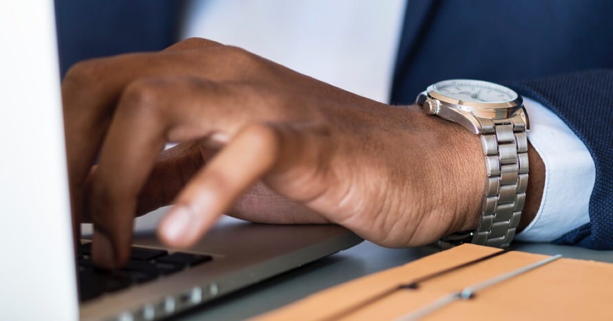 Man at laptop doing marketing writing for website